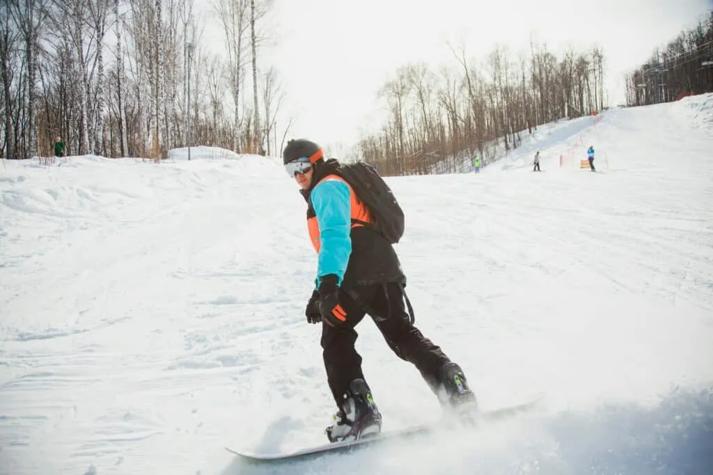how to stand on a snowboard